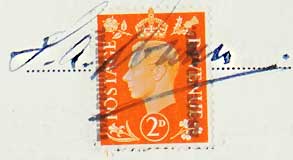 George VI postage stamp used to show payment of purchase tax with the signature of the recipient across it.