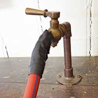 A domestic brass gas tap for gas fires, 1940s and 1950s UK