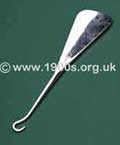 Old everyday hook with one end a shoe horn