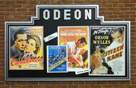Billboard advertising several films from the 1940s, thumbnail