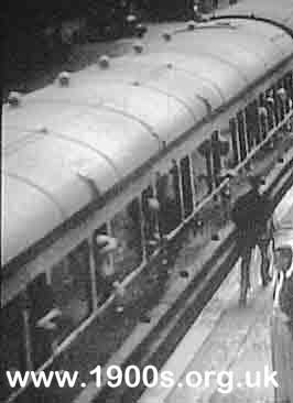 Passengers leaning out of train windows, 1940s-1950s