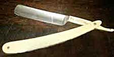 straight azor partly folder out of its protective bone handle