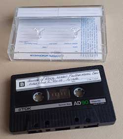 Early compact cassette tape and its box