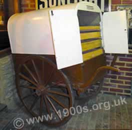 Two-wheeled hand cart used by bakers to deliver their wares in the UK of the early 1900s.