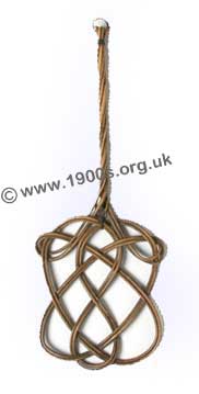 old carpet beater for beating the dust out of carpets - common in the early 1900s