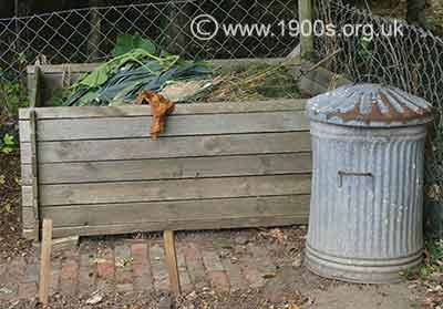 Homemade wooden compost bin for green and garden waste