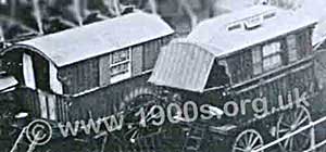 Gypsy caravans - detail from an early 1900s photograph of a gypsy camp.