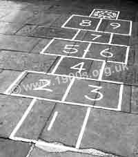 Hopscotch marked out on paving slabs