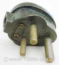Old round pin electric plug for a wall socket, 1940s and 1950s UK