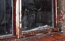 Rusting metal window frames