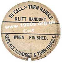Label on a wind-up phone showing instructions