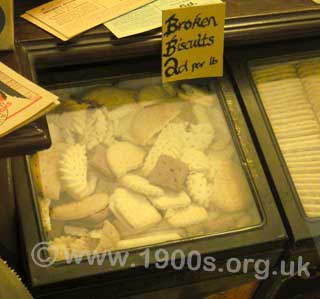 Broken biscuits stored and displayed in shops a transparent top tin which had to be opened for each sale, common in the 1940s