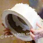 2 of 3: Imitation cake lifted to show that it is a hollow cover -
as used during rationing in World War Two.