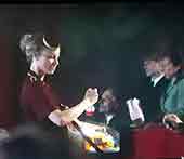 Cinema usherette selling refreshments, close-up