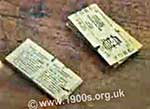 Old British return train tickets, (designed to be torn into two halves) and used as shown by the clip