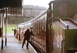 Guard checking a train door