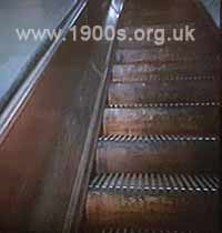 old escalator with wooden slatted treads