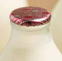 Foil milk bottle top on a glass milk bottle