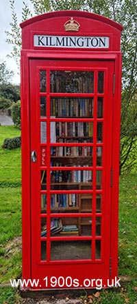Red public phone box taken over as a library