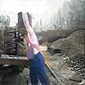 coalman loading sacks of coal onto a lorry, courtesy of Terry Martinelli.