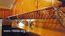 Old train luggage rack, corded like a hammock, 1940s and 1950s Britain and probably before