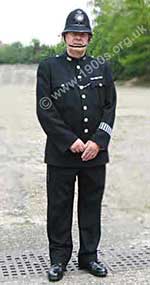 British policeman in genuine 1940s uniform
