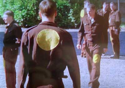Uniform of foreign prisoners of war held
in UK in WW2 showing characteristic yellow circle uniform