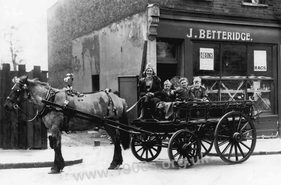 Rag and bone horse and cart outside their premises, 1930s