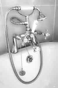 Bath and shower taps, reminiscent of cradle telephones