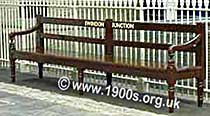1940s or 1950s British railway station bench seat with a back, wooden and marked with its home station