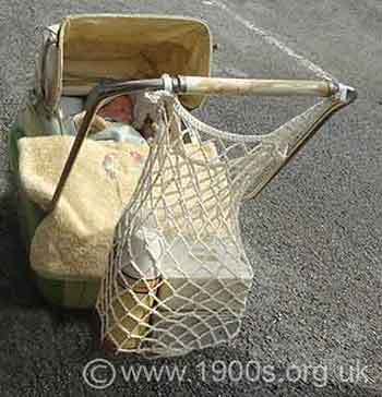 string bag over handle of pram or push chair