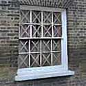 windows taped against bomb blast in WW2