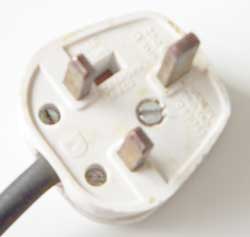 An old 13 amp plug, bought separately from and wired onto a cable.
