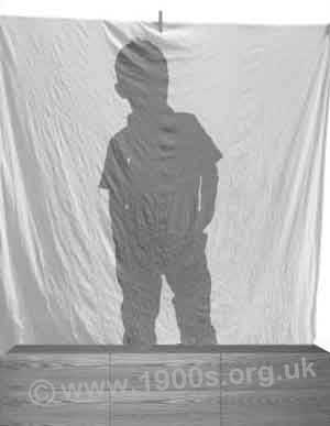 shadow on screen of boy