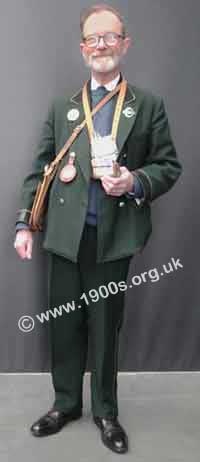 Graham Burgess in authentic mid 1900s bus conductor uniform