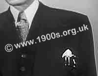 1940s and 1950s business man's breast pocket with a range of fountain pens and propelling pencils clipped inside and a white pocket handkerchief - all the unspoken 'uniform' of his work