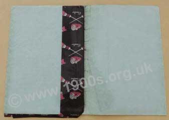 Pack of foolscap carbon papers in a protective wallet