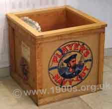 Cigarette advert for Players cigarettes on a wooden waste bin, c1930s