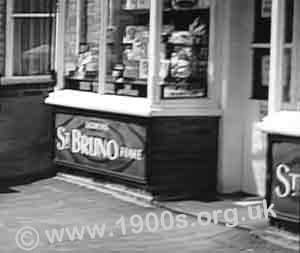 Support wall below a shop window advertising St Bruno tobacco, 1940s