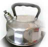 Early whistling kettle showing the separate whistle pushed onto the spout.