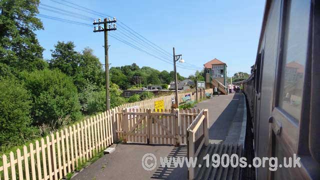 Heritage station platform showing telegraph wires along railway lines