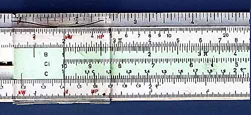 Slide rule with its cursor over the first number to be multiplied with the sliding scale slid along so that its 1 is in the same position.
