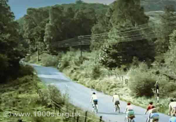 Telegraph wires runing along the side of a road, common in the 1940s and 1950s
