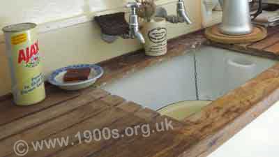 Wooden draining board, common in early kitchens and sculleries