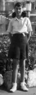 P E uniform of Copthall County Grammar School, 1950s: green aertex blouse and navy shorts