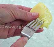 Cooled parboiled potatoes scored with a fork