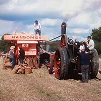Traction engine drives thresher