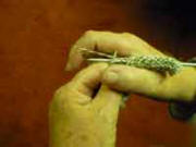 Arrangement of hands on the knitting needles