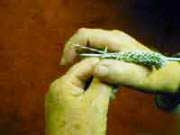 Arrangement of hands on the knitting needles