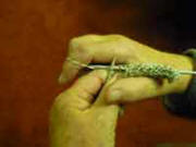 Knitting without taking hands off the needles